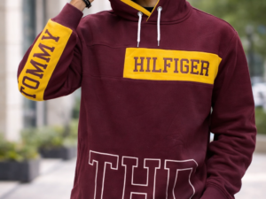 Men wearing maroon winter hoodie with printed design